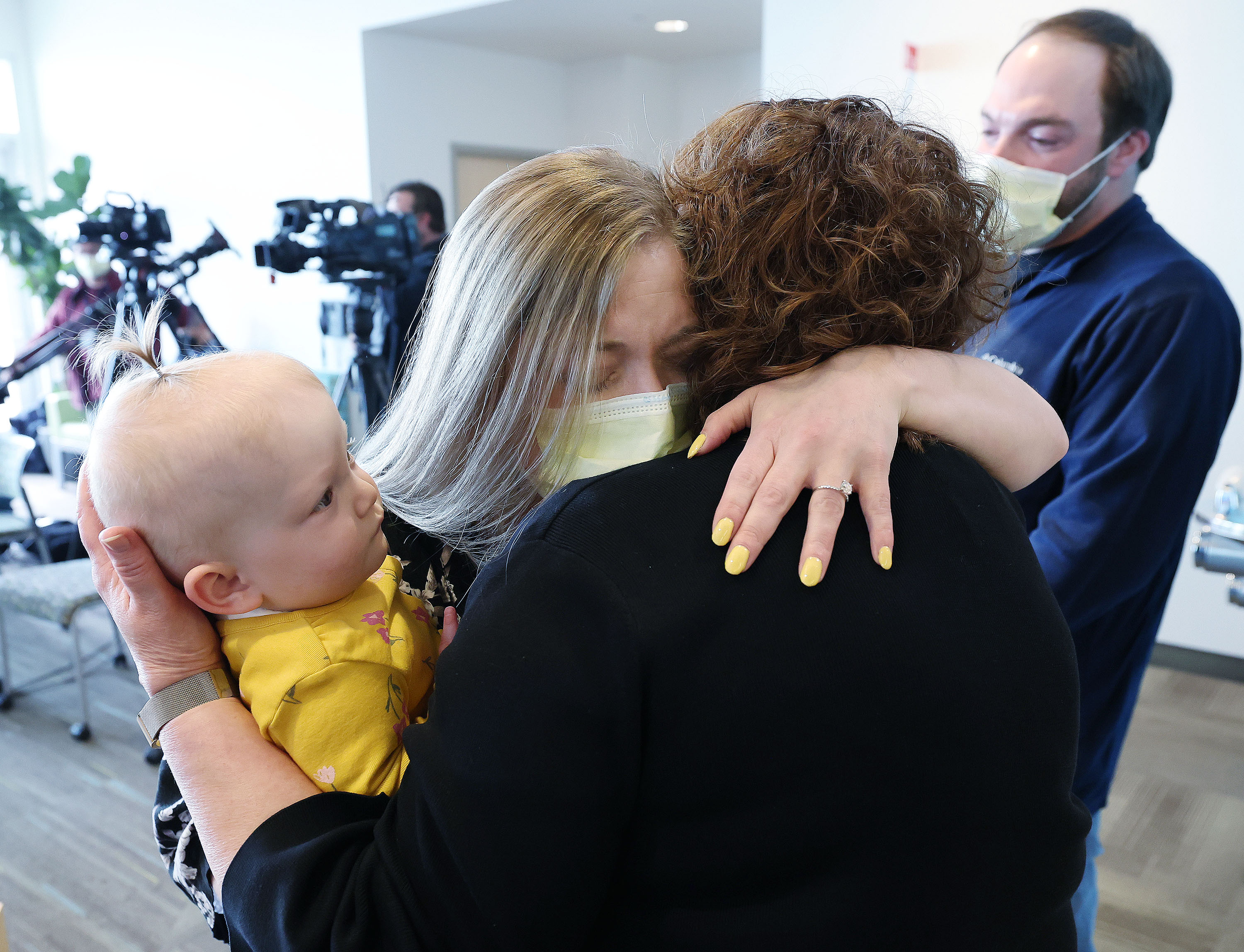 Alisha Keyworth hugs Dr. Jan Byrne as she and husband Nick celebrate the anniversary of the in utero fetal surgery performed on daughter Abigail at Primary Children’s Hospital in Salt Lake City on Wednesday. Abigail,11 months, has spina bifida and was the first in utero fetal surgery patient in the state of Utah.