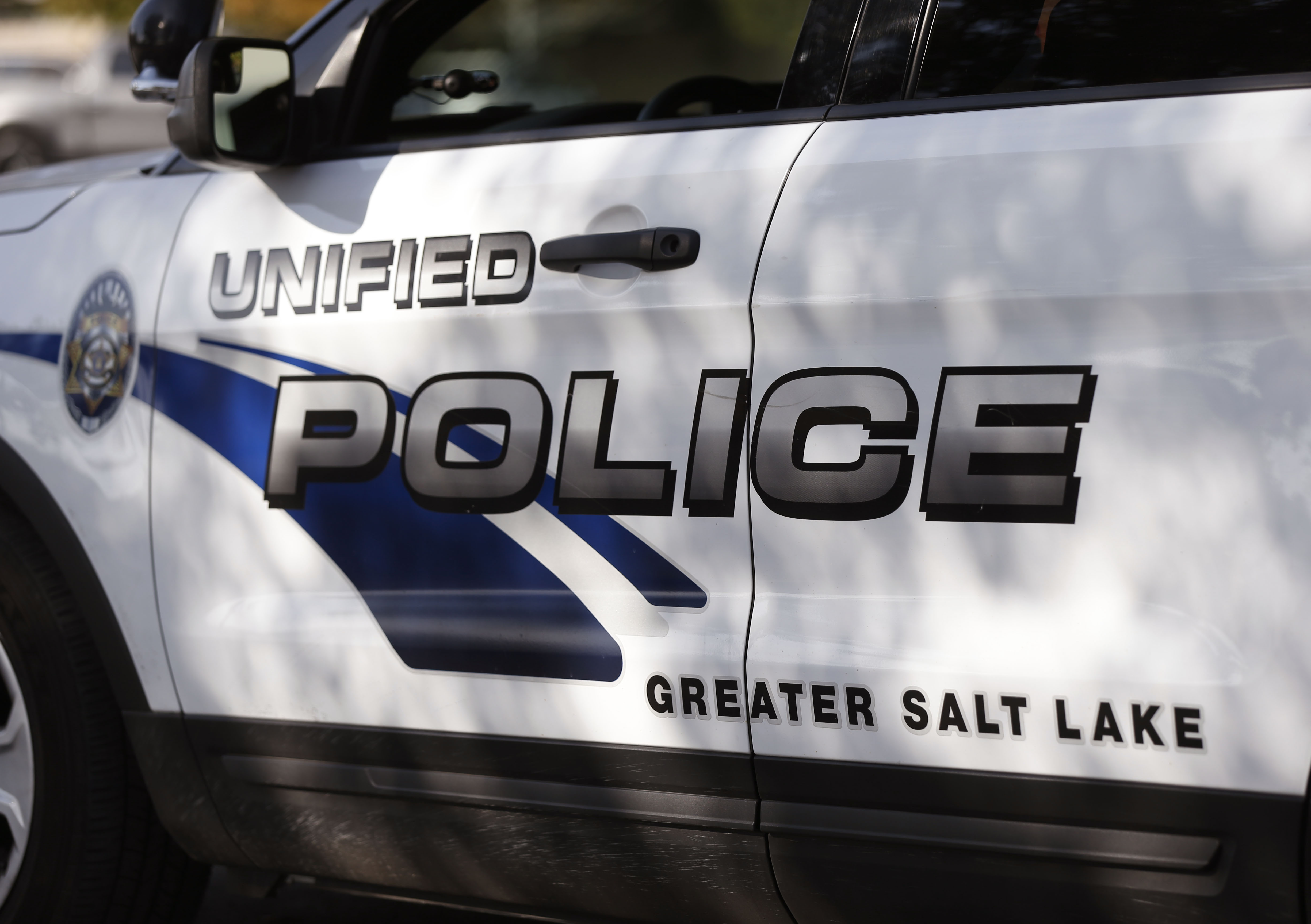 A man allegedly upset that his briefcase was tossed in a dumpster was arrested Thursday after police say he assaulted a maintenance worker at an apartment complex and fired multiple shots.