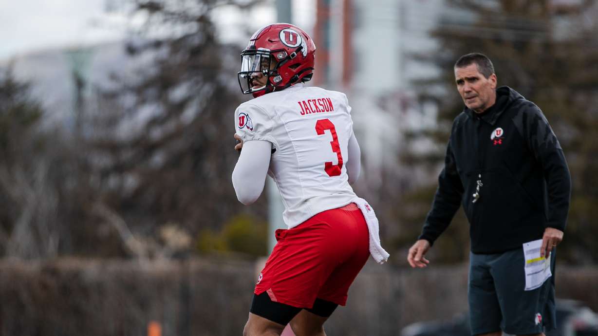 Utah quarterback Ja'Quinden Jackson goes through throwing reps as part of the football team's spring camp.