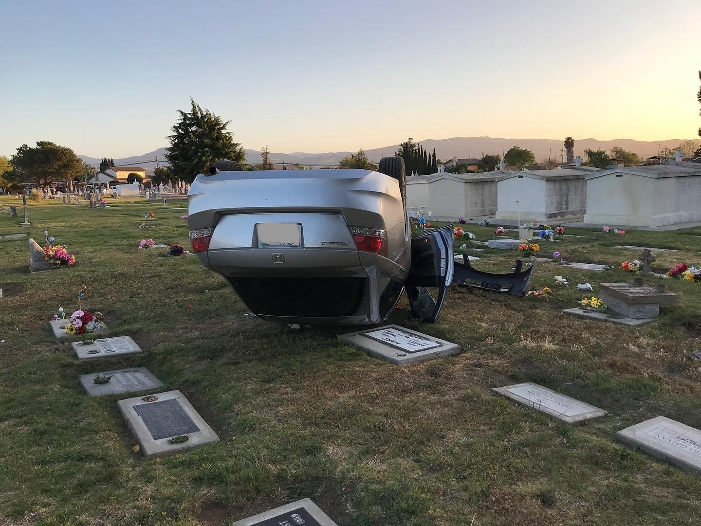 Hollister Police arrested a driver for a DUI on Tuesday after rolling their car over at Calvary Cemetery in Hollister, California.