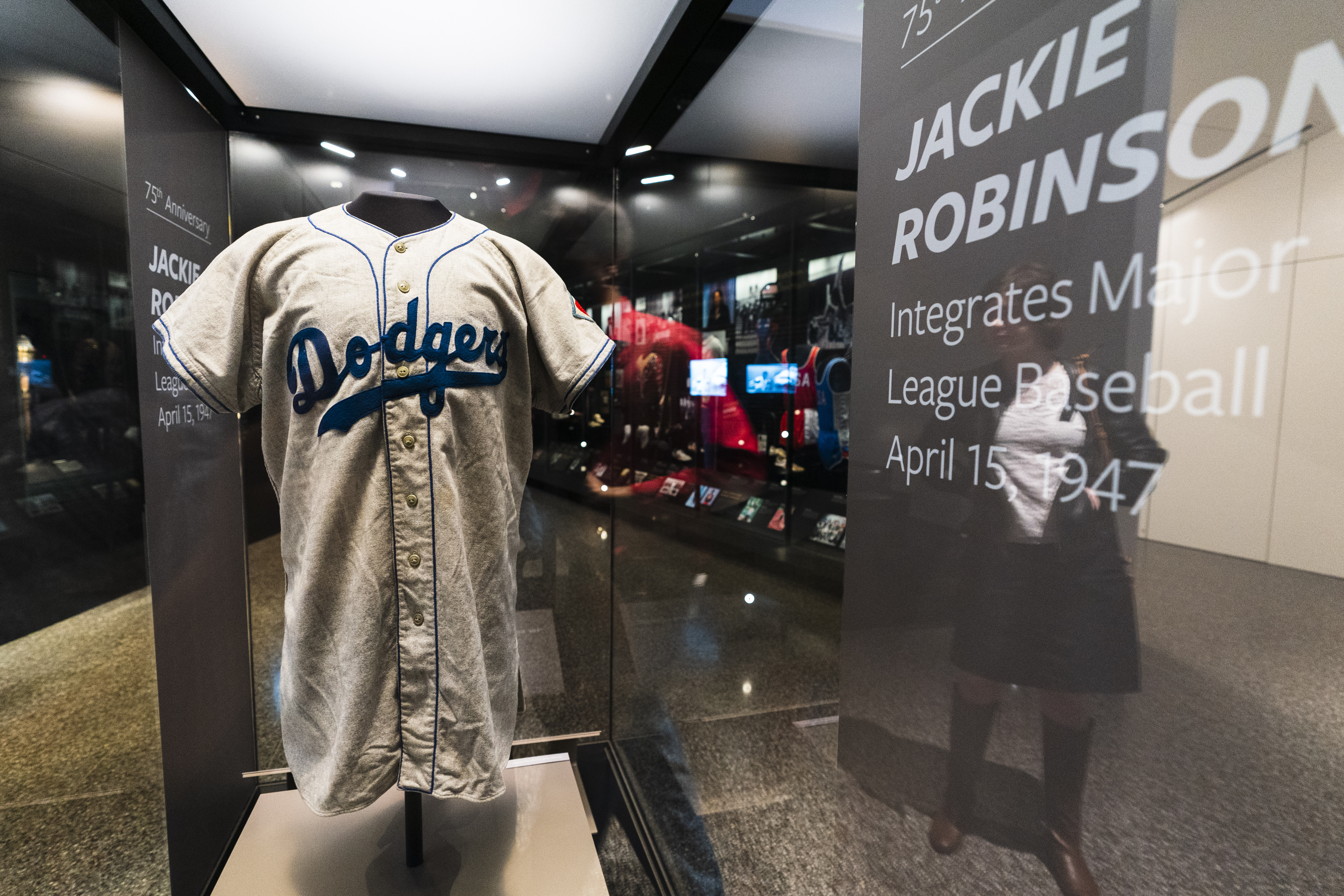 A jersey of Jackie Robinson is displayed at the National Museum of African American History and Culture in Washington, commemorating the 75th anniversary of Jackie Robinson's integration of Major League Baseball, Thursday, April 7, 2022. Robinson became the first African American to play in Major League Baseball breaking the baseball color barrier on April 15, 1947, when he started at first base for the Brooklyn Dodgers. 