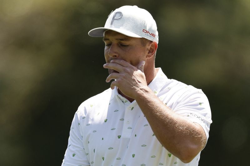 FILE PHOTO: Golf - The Masters - Augusta National Golf Club - Augusta, Georgia, U.S. - April 7, 2022 Bryson DeChambeau of the U.S. reacts after a putt on the 8th hole during the first round