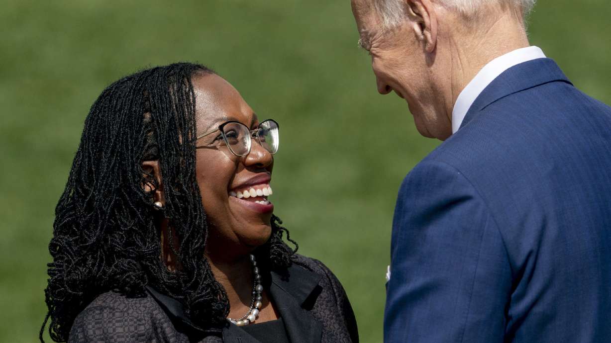 Judge Ketanji Brown Jackson and President Joe Biden embrace during an event on the South Lawn of the White House in Washington, April 8, celebrating the confirmation of Jackson as the first Black woman to reach the Supreme Court.
