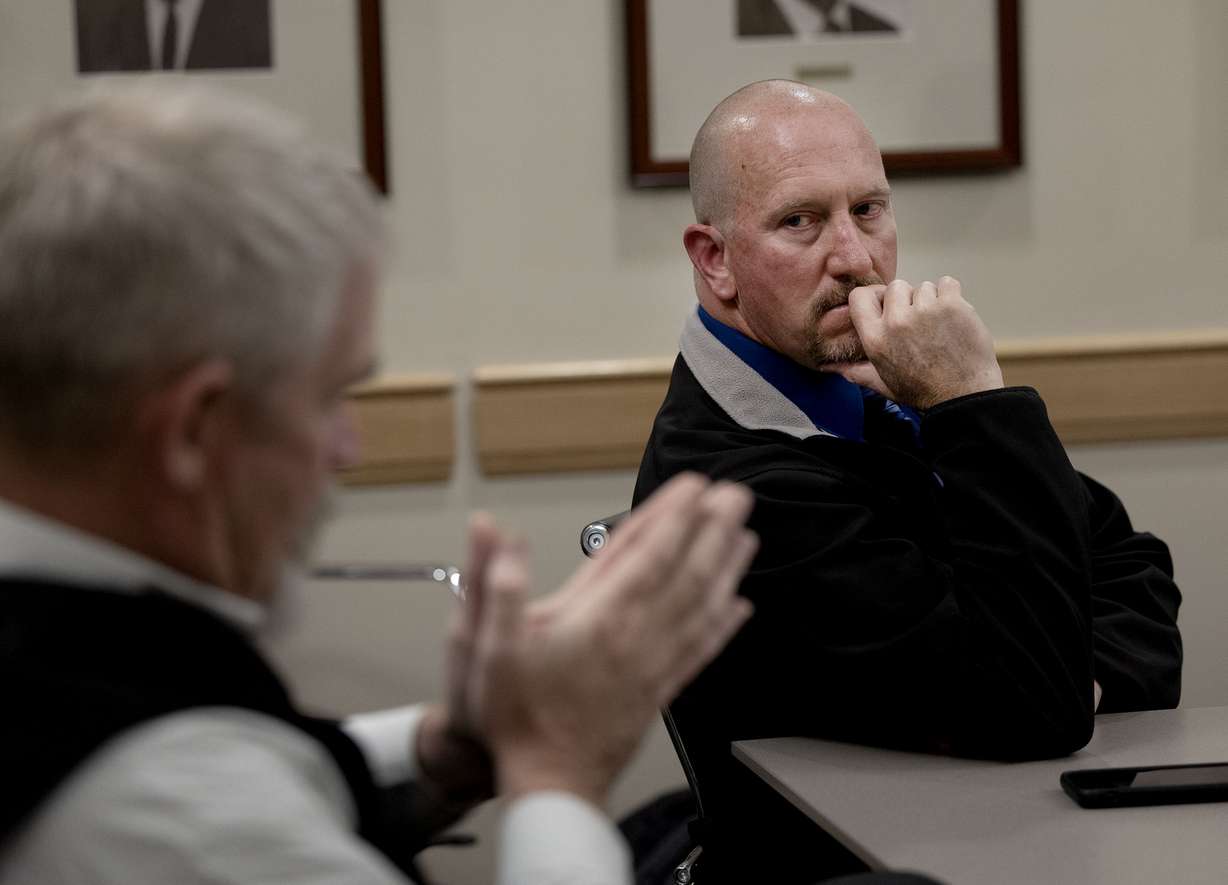 Carbon County Sheriff’s detective Travis Henrie, right, listens as detective Wally Hendricks, left, speaks with volunteers of DontHit.org, a support group for people impacted by sexual assault, at Utah State University Eastern in Price on Wednesday. Many of the volunteers are survivors of sexual assault. The group discussed how to support victims of sexual assault.