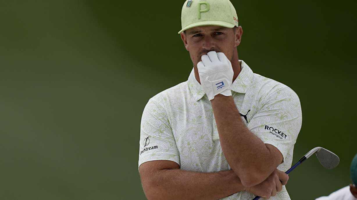 Bryson DeChambeau waits to take his shot to the seventh bunker during the second round at the Masters golf tournament on Friday, April 8, 2022, in Augusta, Ga.