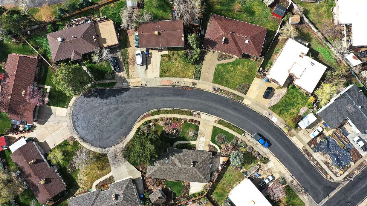 Homes in Cottonwood Heights are pictured on Friday. Homebuying demand continues to falter this spring as new listings fell 7% from a year earlier. The average 30-year fixed mortgage rate shot up to 5% and the median asking price climbed to $397,747.