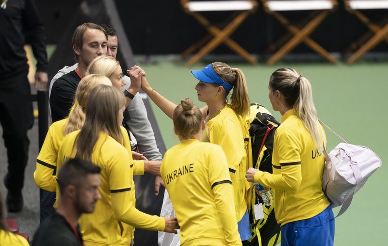 Apr 15, 2022; Asheville, NC, USA;  Katarina Zavatska (UKR) with her teammates after her match against Jessica Pegula (USA) in the second match of the USA vs Ukraine Billie Jean King Cup tie at Harrah's Cherokee Center.