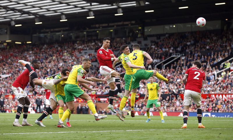 Soccer Football - Premier League - Manchester United v Norwich City - Old Trafford, Manchester, Britain - April 16, 2022 Manchester United's Cristiano Ronaldo heads at goal
