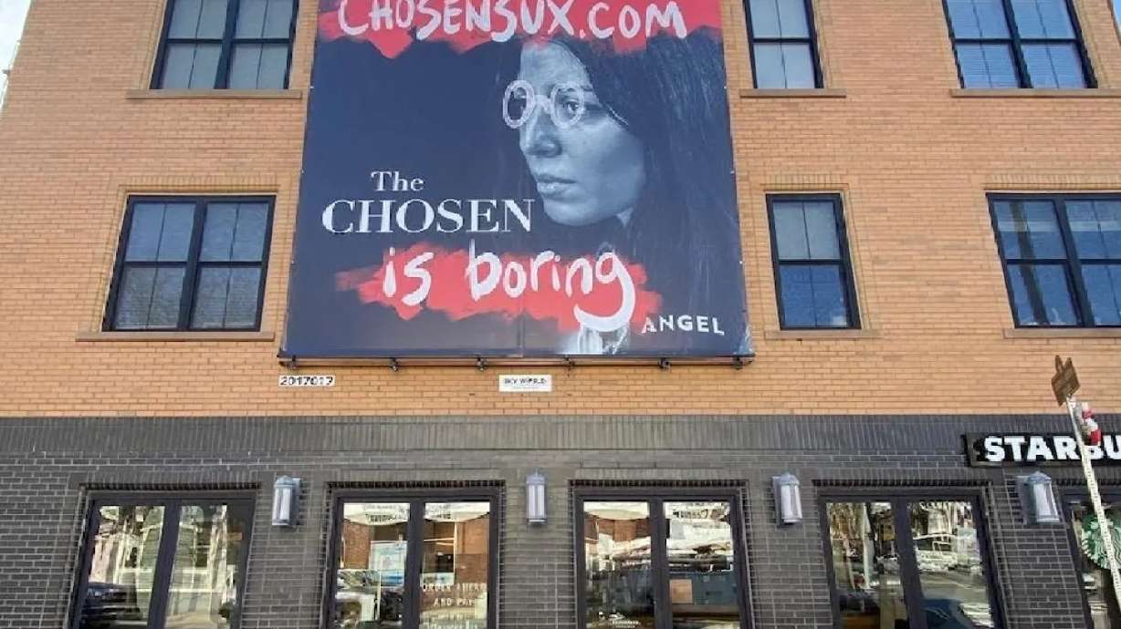 One of 70 “defaced” billboards for “The Chosen” is pictured in Boston. The defaced billboards are part of an ad campaign ruse planned by marketers of the popular faith-based show.