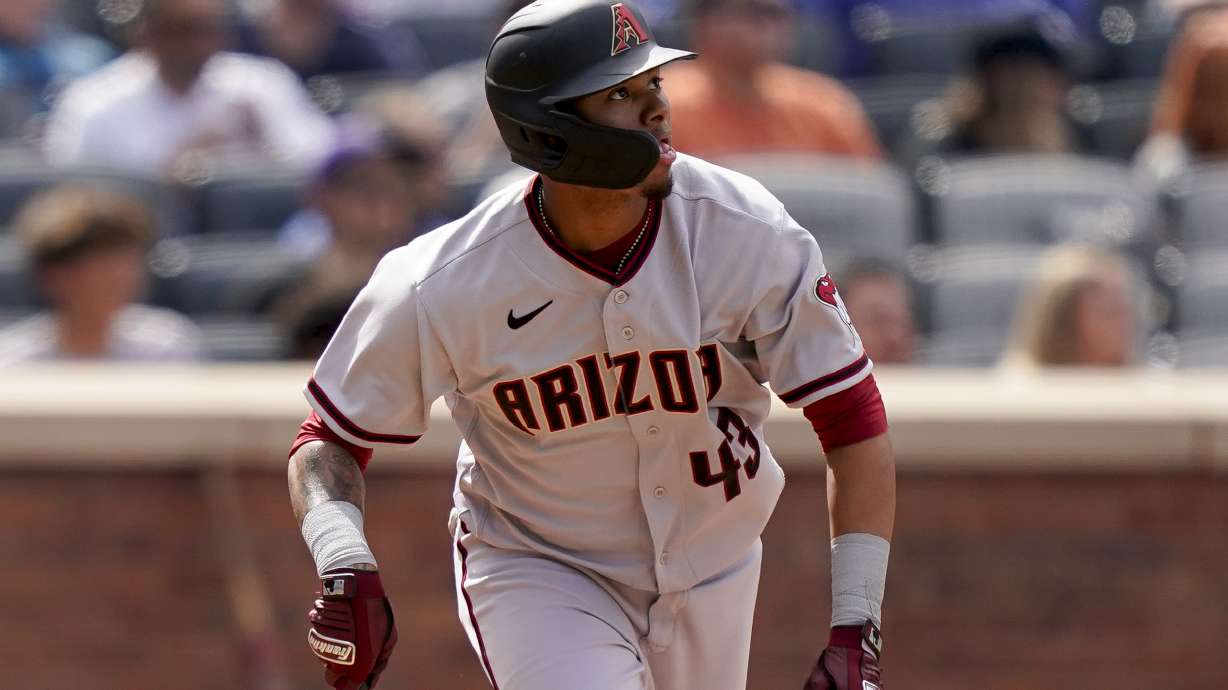 Arizona Diamondbacks' Sergio Alcantara hits a two-run home run off New York Mets relief pitcher Seth Lugo (67) in the seventh inning of a baseball game, Saturday, April 16, 2022, in New York.