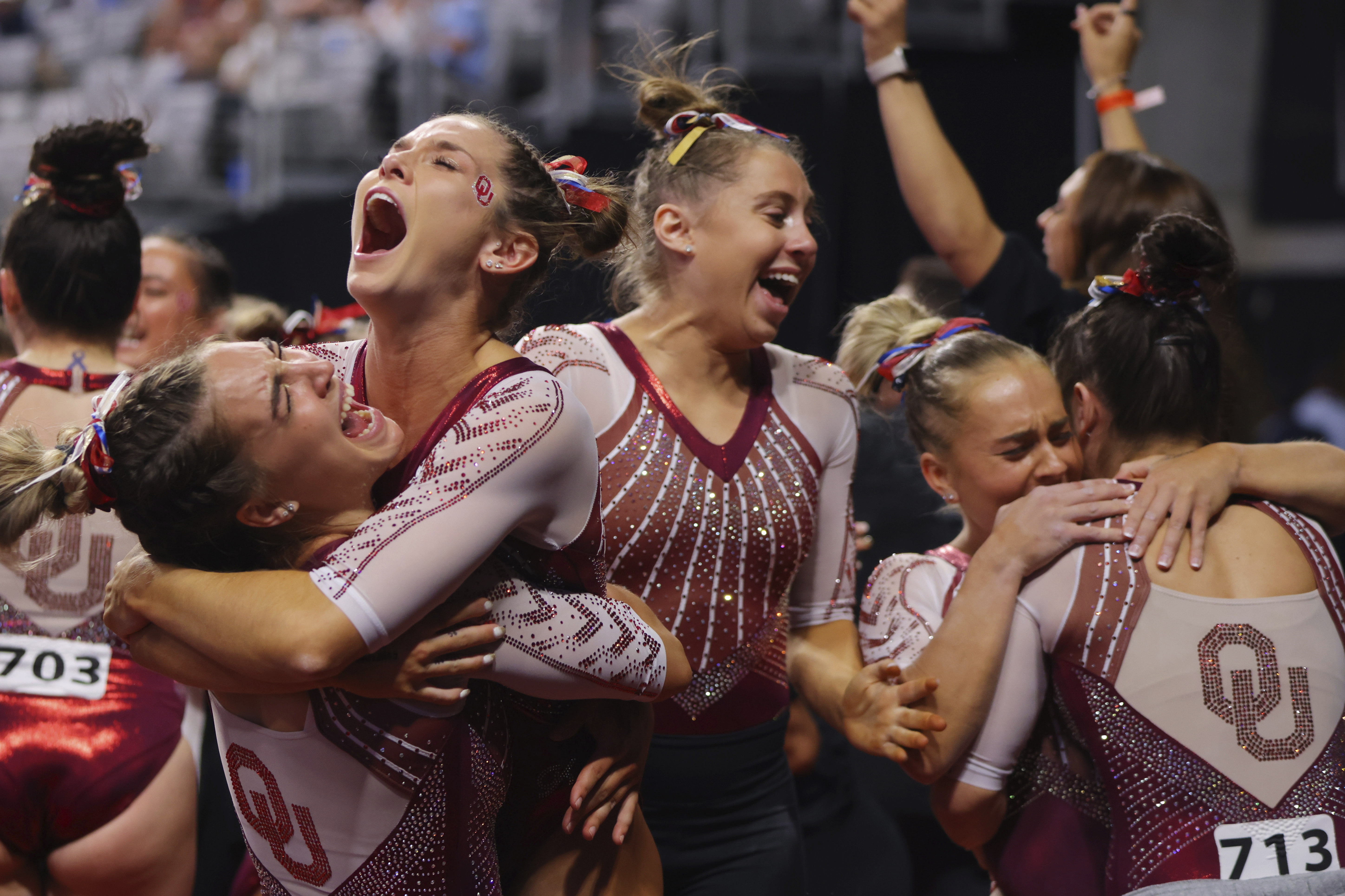 Oklahoma team celebrates their victory together after the NCAA college women's gymnastics championships, Saturday, April 16, 2022, in Fort Worth, Texas. 