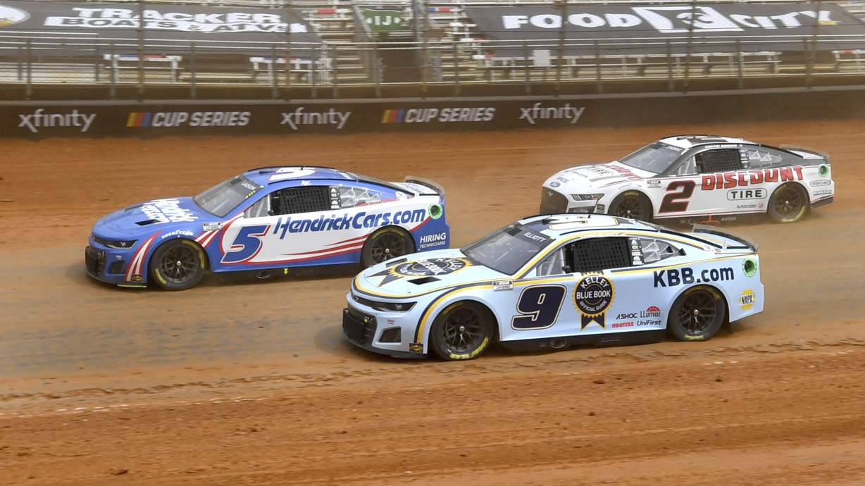 Kyle Larson (5) Chase Elliott (9) and Austin Cindric (2) drive out of Turn 4 during a practice session Friday, April 15, 2022, for Sunday's NASCAR Cup Series auto race at Bristol Motor Speedway in Bristol, Tenn.
