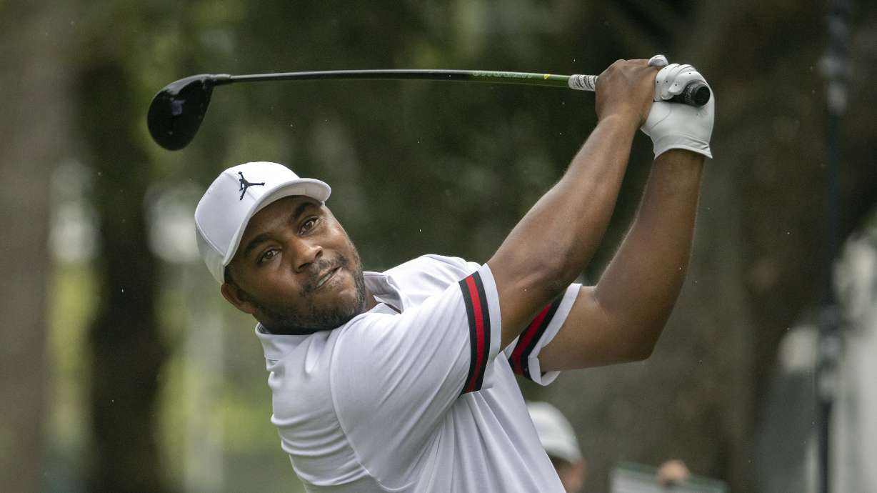 Harold Varner III watches his drive down the 16th fairway during the third round of the RBC Heritage golf tournament, Saturday, April 16, 2022, in Hilton Head Island, S.C.