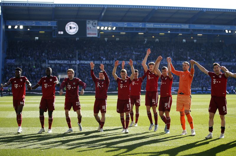 Soccer Football - Bundesliga - Arminia Bielefeld v Bayern Munich - Bielefelder Alm, Bielefeld, Germany - April 17, 2022 Bayern Munich players celebrate after the match