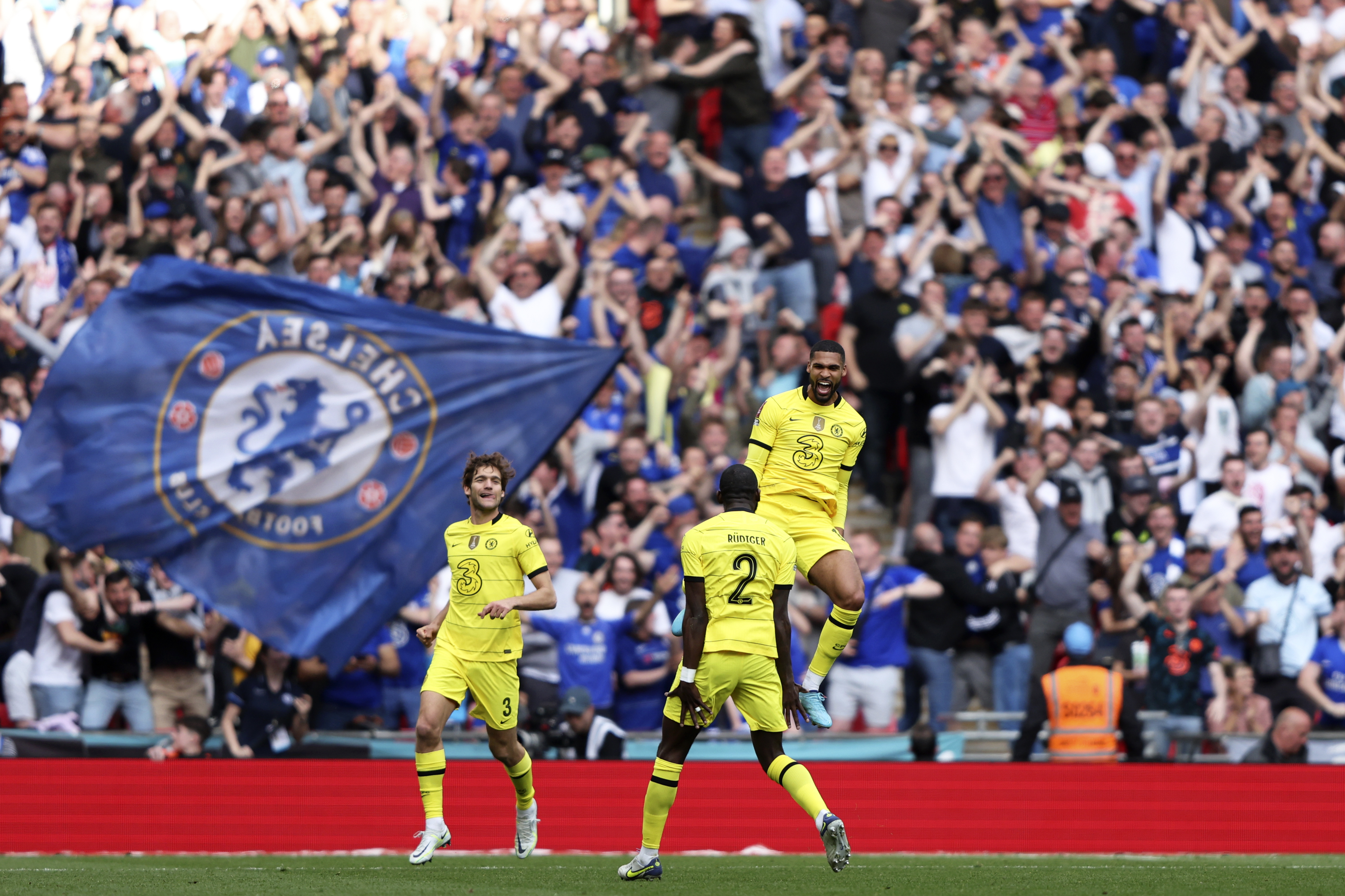 Chelsea's Ruben Loftus-Cheek, right, celebrates after scoring the opening goal during the English FA Cup semifinal soccer match between Chelsea and Crystal Palace at Wembley stadium in London, Sunday, April 17, 2022. 