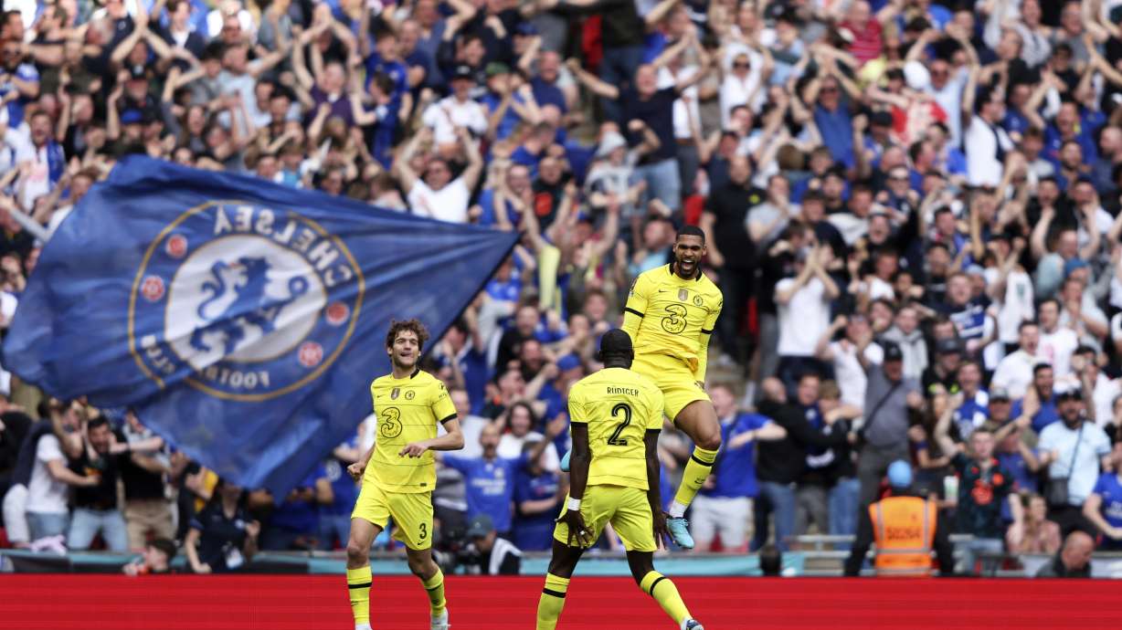 Chelsea's Ruben Loftus-Cheek, right, celebrates after scoring the opening goal during the English FA Cup semifinal soccer match between Chelsea and Crystal Palace at Wembley stadium in London, Sunday, April 17, 2022.