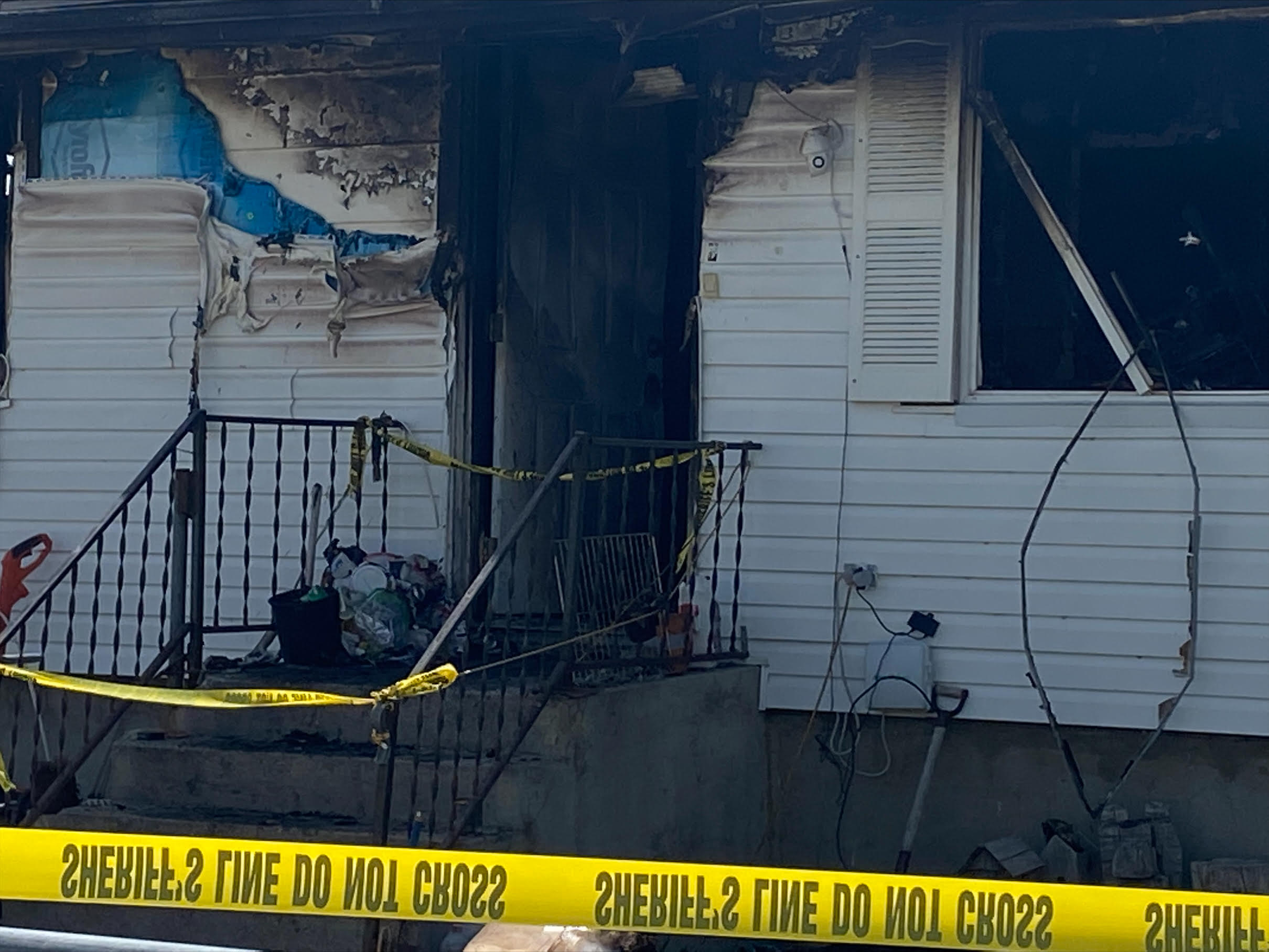 Three people died in a house fire in Delta on Saturday, police said.