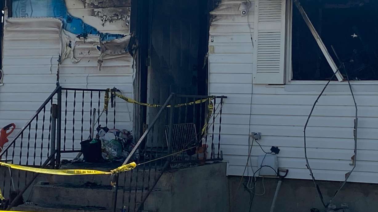 Three people died in a house fire in Delta on Saturday, police said.