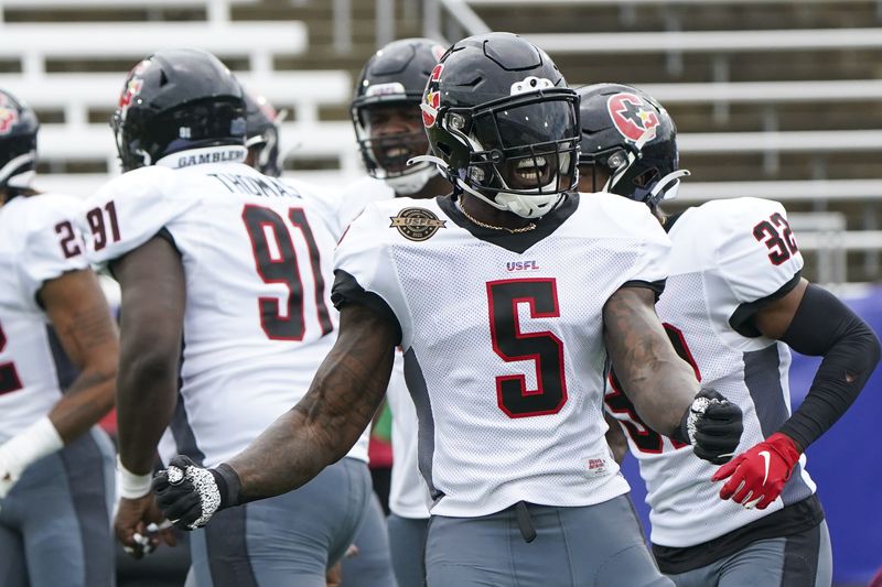 Apr 17, 2022; Birmingham, AL, USA; Houston Gamblers linebacker Reggie Northrup (5) reacts after a play against Michigan Panthers at Protective Stadium.