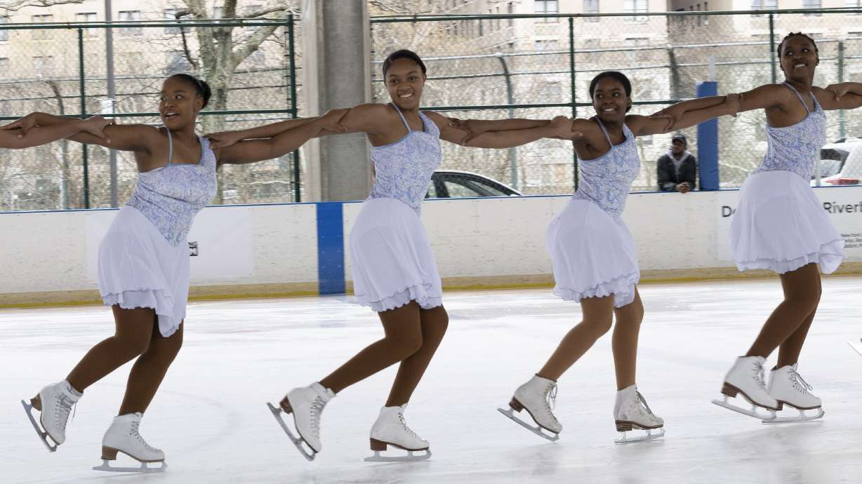 This photo provided by Figure Skating in Harlem shows Figure Skating in Harlem students performing in the 2022 Ice Show, City of Dreams - A Skating Love Letter to NYC at Riverbank State Park in New York, March 20, 2022. The organization’s objective always has been helping girls of color transform their lives by growing in confidence, leadership and academic achievement.