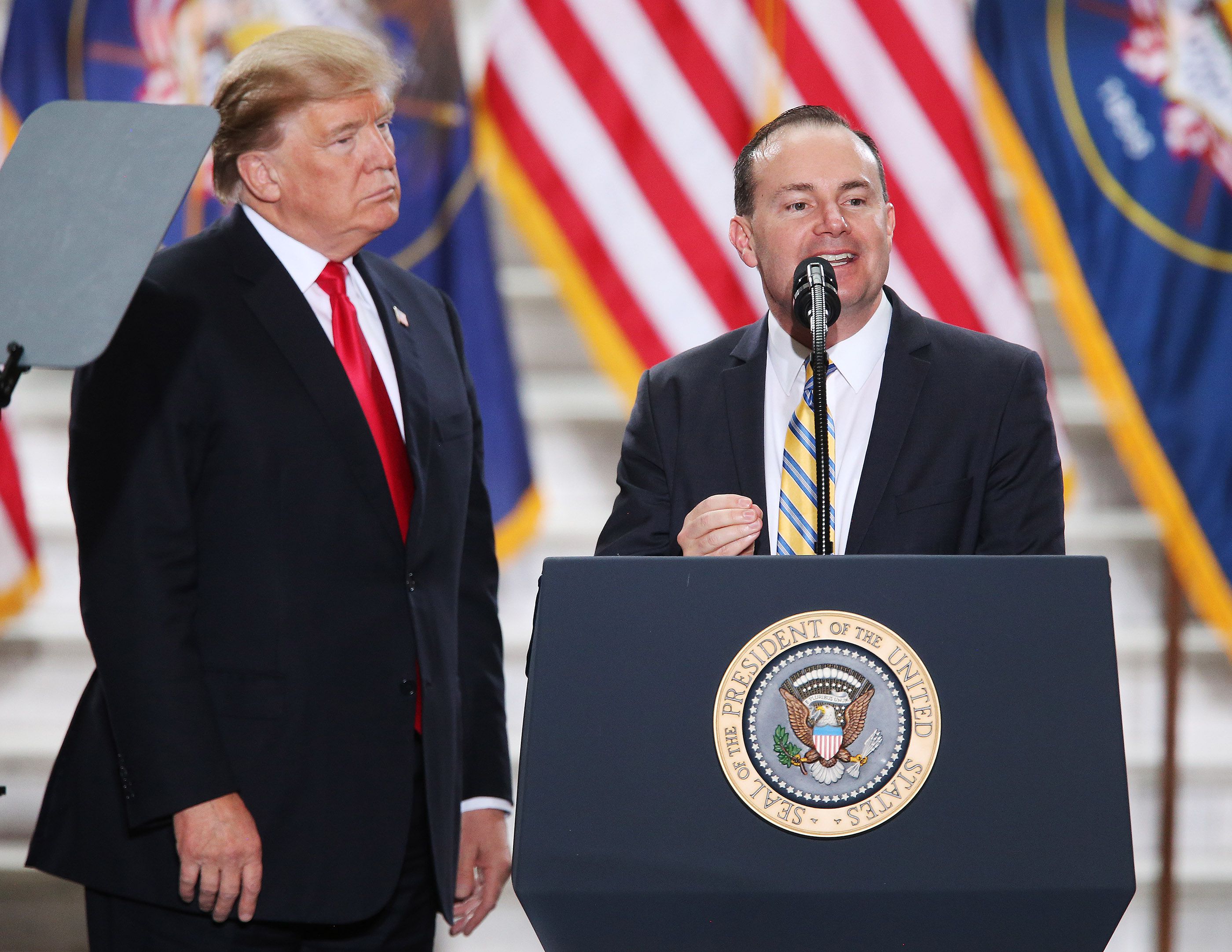 President Donald Trump looks as Sen. Mike Lee, R-Utah, speaks at the Capitol in Salt Lake City on Dec. 4, 2017. Trump endorsed Lee a couple of weeks ago, but the Utah Republican’s reelection campaign hasn’t made a peep about it.