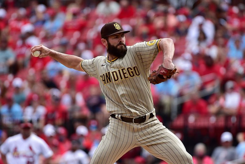 FILE PHOTO: Sep 19, 2021; St. Louis, Missouri, USA;  San Diego Padres starting pitcher Jake Arrieta (49) pitches during the first inning against the St. Louis Cardinals at Busch Stadium.