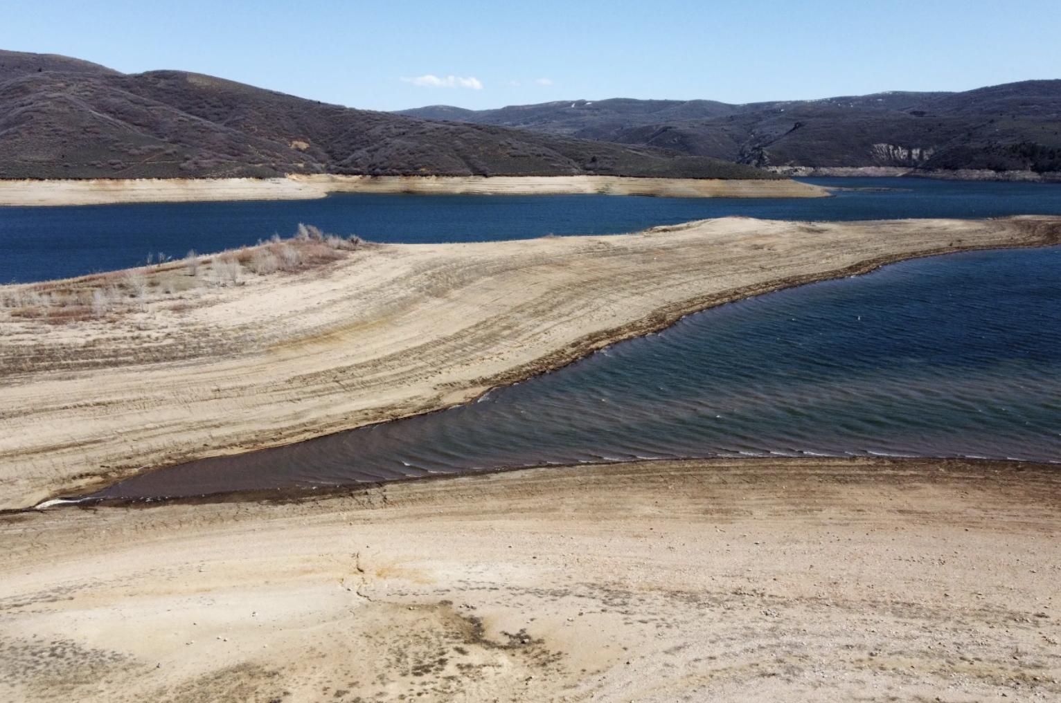 Very low water levels at Jordanelle Reservoir in Wasatch County are pictured after Gov. Spencer Cox and Lt. Governor Deidre Henderson ceremonially signed key water legislation on Monday.