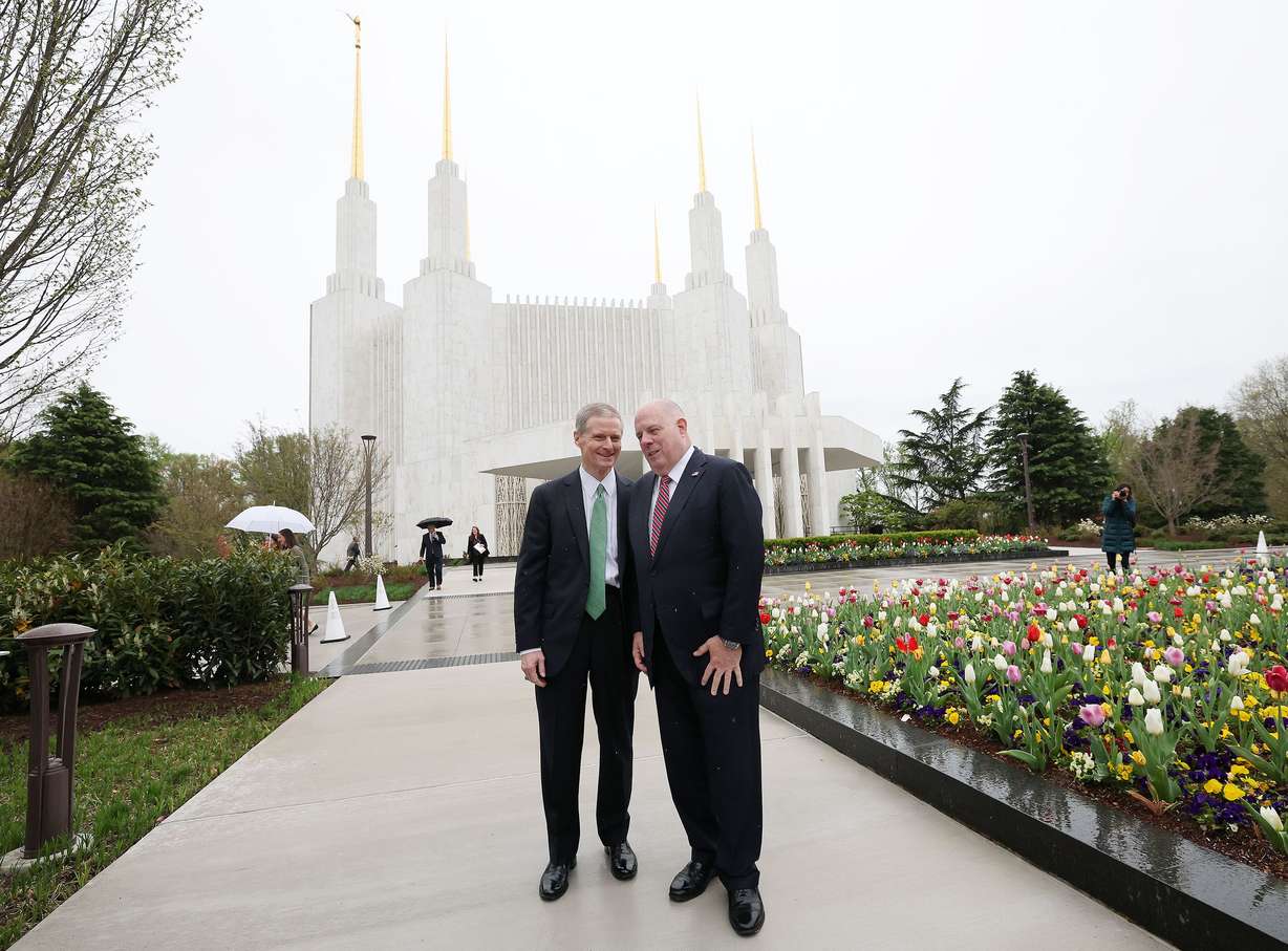 Elder David A. Bednar, a member of The Church of Jesus Christ of Latter-day Saints’ Quorum of the Twelve Apostles, left, shares a moment with Maryland Gov. Larry Hogan after a tour of the Washington D.C. Temple and visitors’ center in Kensington, Maryland, on Monday.