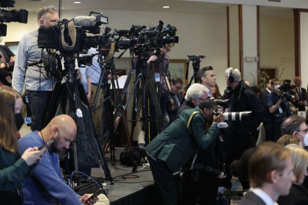 Members of the media cover a press conference at The Church of Jesus Christ of Latter-day Saints' Washington D.C. Temple in Kensington, Maryland, on Monday.