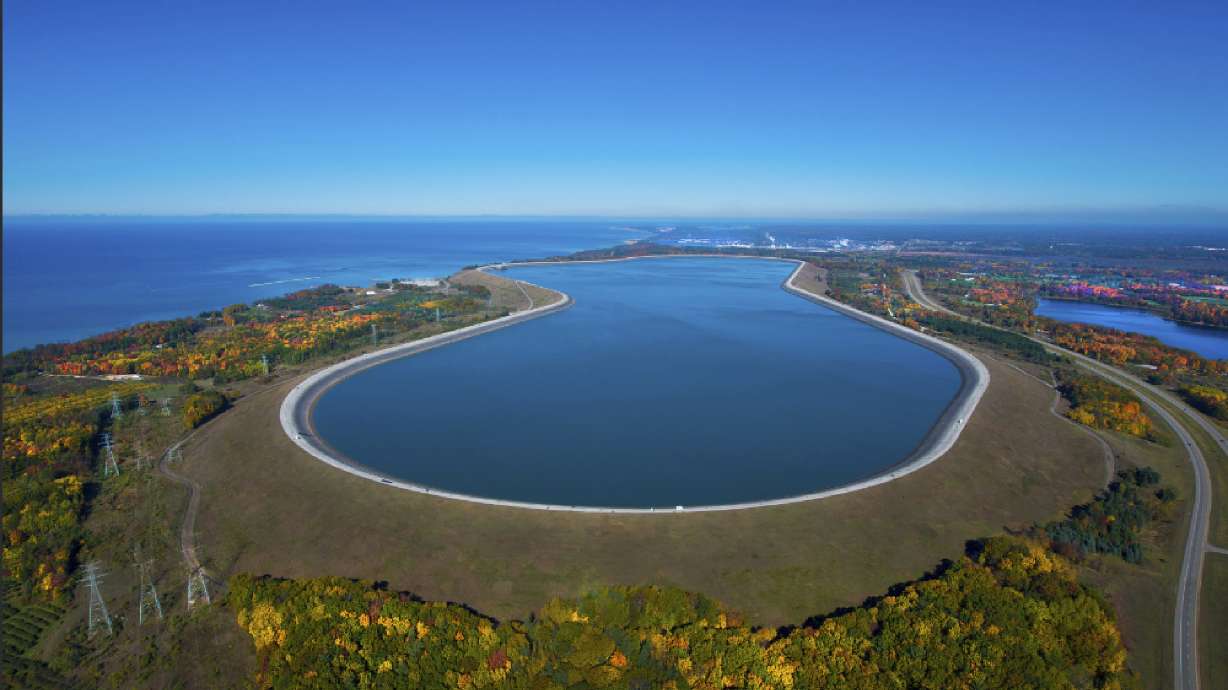 An aerial view of the Ludington Pumped Storage Plant near Ludington, Mich. The plant generates electricity by pumping water from Lake Michigan to a reservoir on top of a bluff, then releasing it through giant turbines as needed.