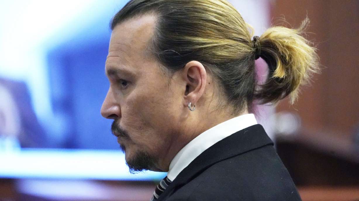 Actor Johnny Depp waits for the jury to come in the courtroom after a break, at the Fairfax County Circuit Courthouse in Fairfax, Va., on Monday. Depp sued his ex-wife Amber Heard for libel in Fairfax County Circuit Court after she wrote an op-ed piece in The Washington Post in 2018 referring to herself as a "public figure representing domestic abuse."