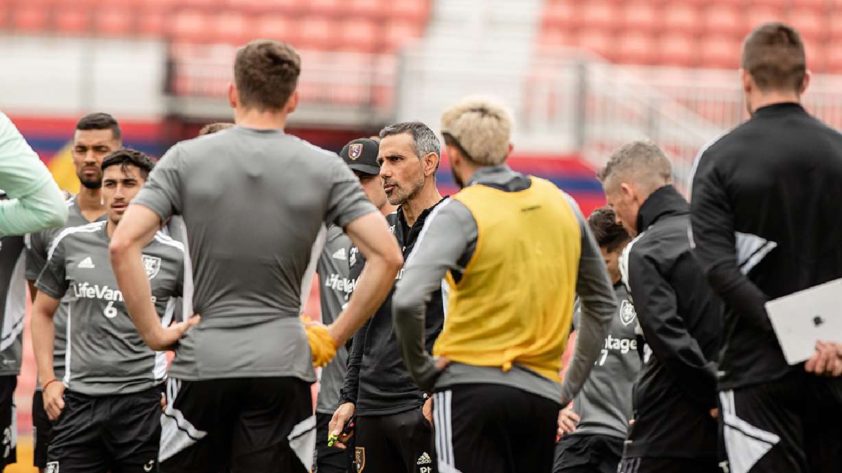 Head coach Pablo Mastroeni, middle, instructs the team during training at Rio Tinto Stadium on Tuesday.
