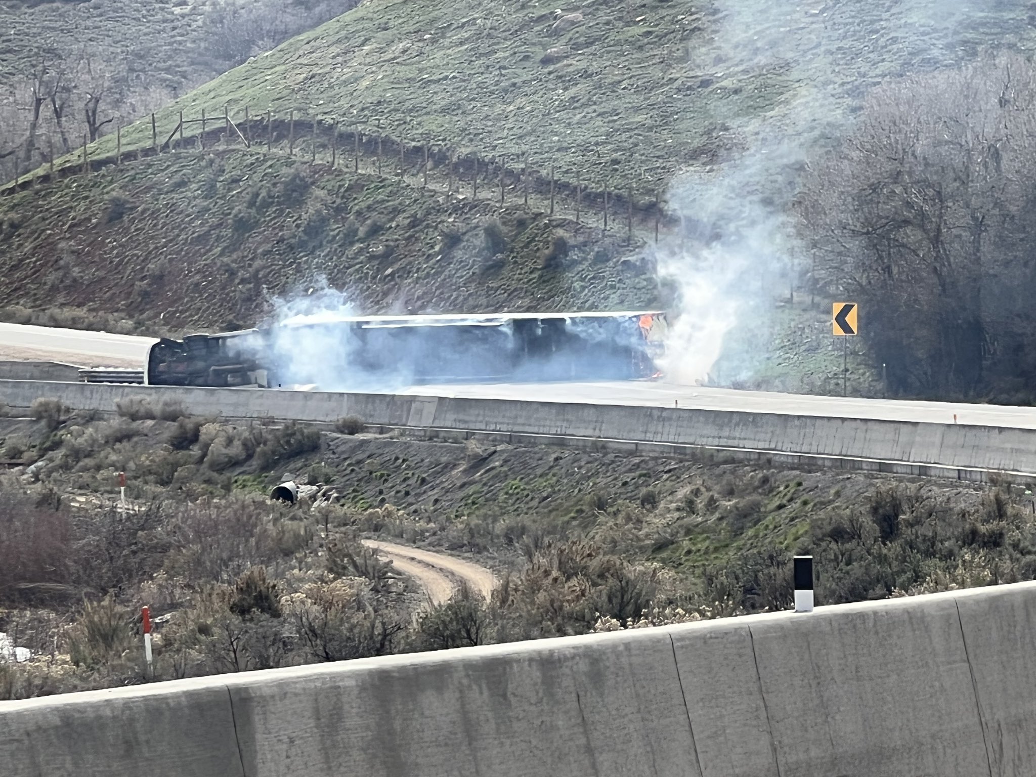 The shelter-in-place order for residents living near Tollgate Canyon in Summit County was lifted Tuesday night; eastbound lanes of I-80 reopened while one westbound lane remained closed after a semitruck containing hazardous materials rolled over.