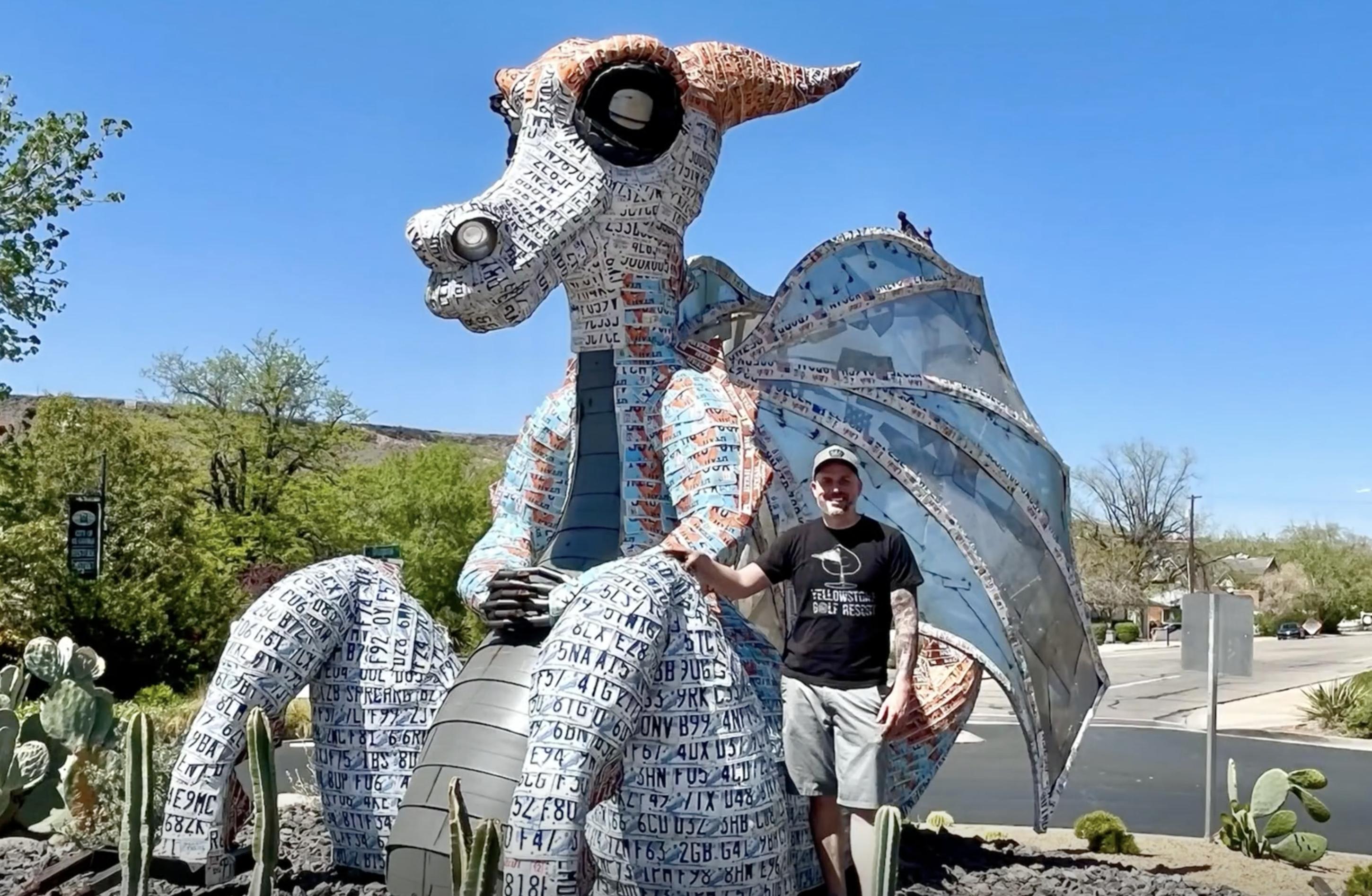 Deveren Farley stands with his art piece, "Dad," on April 9 in St. George.
