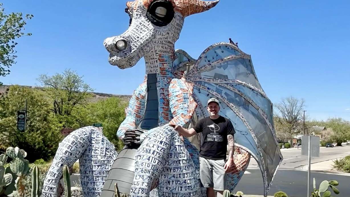 Deveren Farley stands with his art piece, "Dad," on April 9 in St. George.