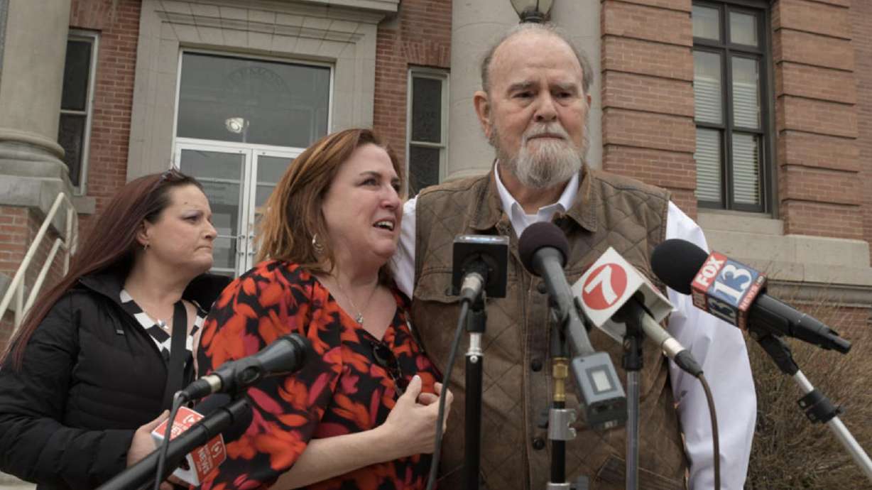 Kay and Larry Woodcock with their daughter at the Fremont County Courthouse during a press conference following Lori Daybell’s arraignment April 19, 2022. They say they were “completely blindsided and heartbroken” learning they might not be able to sit in the courtroom during their grandson’s murder trial.