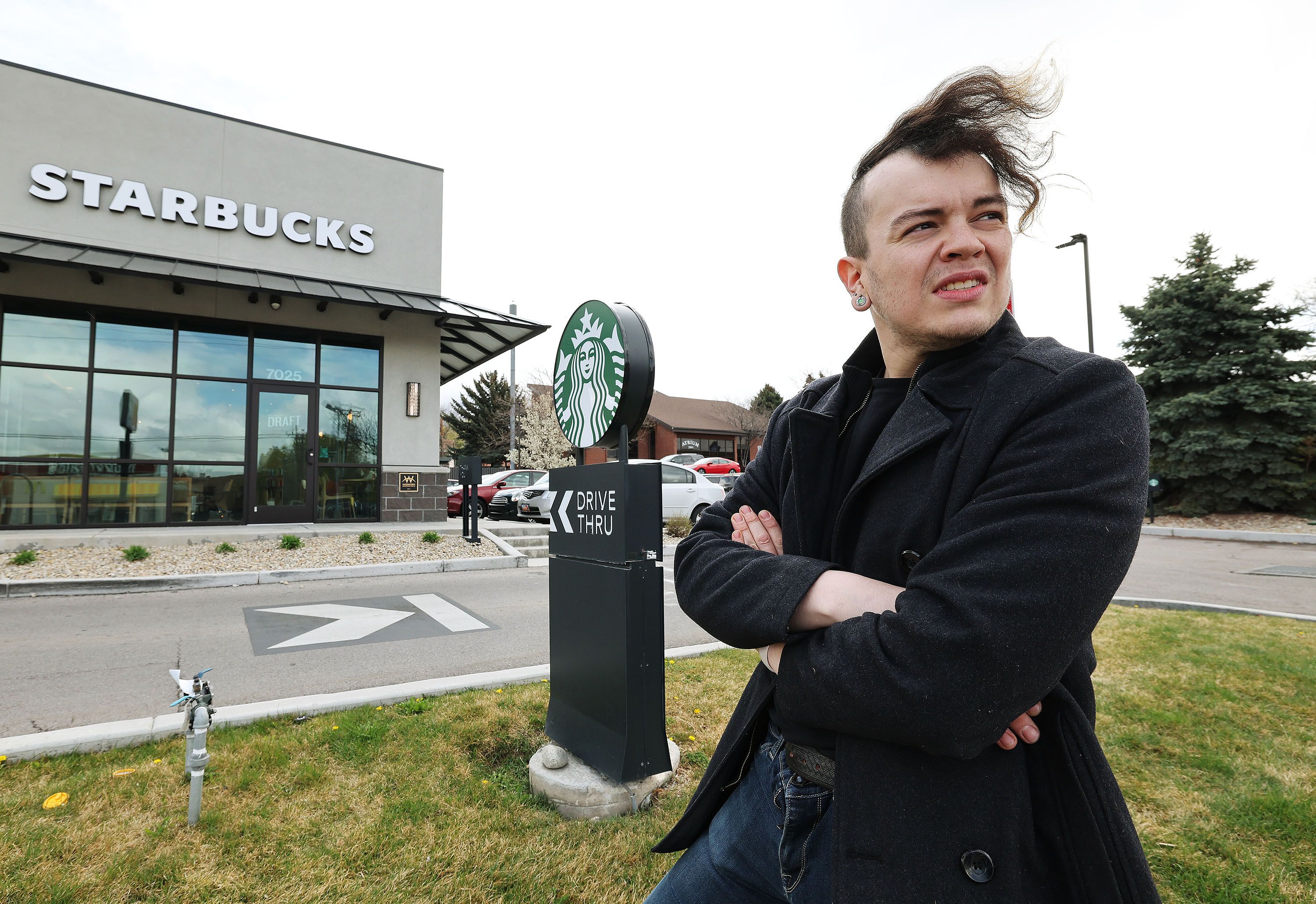 Starbucks employee Jacob Lawson stands near the chain’s coffee store in Cottonwood Heights on April 15. Lawson is the leader of a labor movement to unionize the Cottonwood Heights store, which would be the first in the state to unionize.