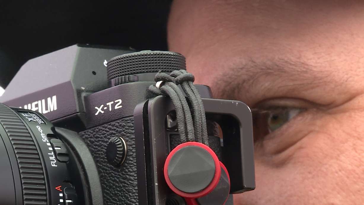 Jason Both photographs Utah Lake on Tuesday. A photo contest will help raise funds for life jacket stations at the lake.