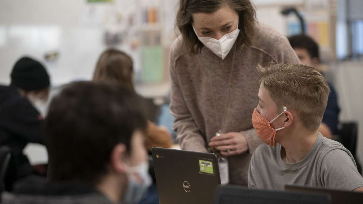 Eighth grade students and their teacher wear masks at Mount Jordan Middle School in Sandy on Jan. 10. A 3rd District Court judge has dismissed a lawsuit by parents that challenged the constitutionality of laws passed by the Utah Legislature and signed into law by Utah Gov. Spencer Cox that limit pandemic restrictions, like mask orders, which they claimed hinders Utah public schools’ ability to safely fulfill children’s right to a free public education.