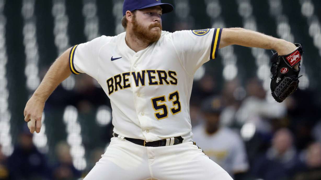 Milwaukee Brewers starting pitcher Brandon Woodruff (53) throws to the Pittsburgh Pirates during the first inning of a baseball game, Wednesday, April 20, 2022, in Milwaukee.