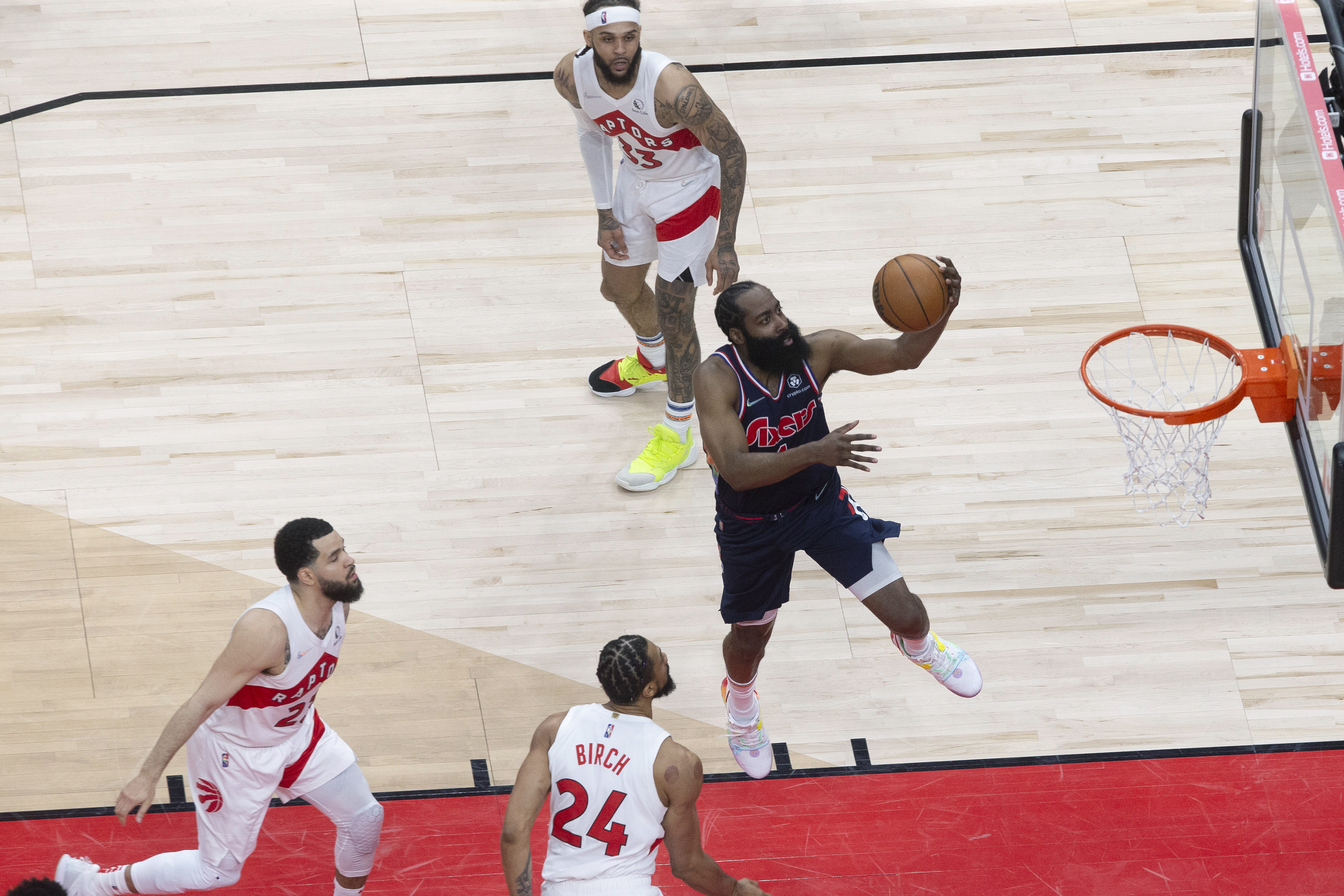 Philadelphia 76ers guard James Harden (1) scores against the Toronto Raptors during the first half of Game 3 of an NBA basketball first-round playoff series, Wednesday, April 20, 2022, in Toronto. 