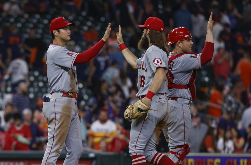 Apr 20, 2022; Houston, Texas, USA; Los Angeles Angels starting pitcher Shohei Ohtani (17) celebrates with teammates after the Angels defeated the Houston Astros at Minute Maid Park.