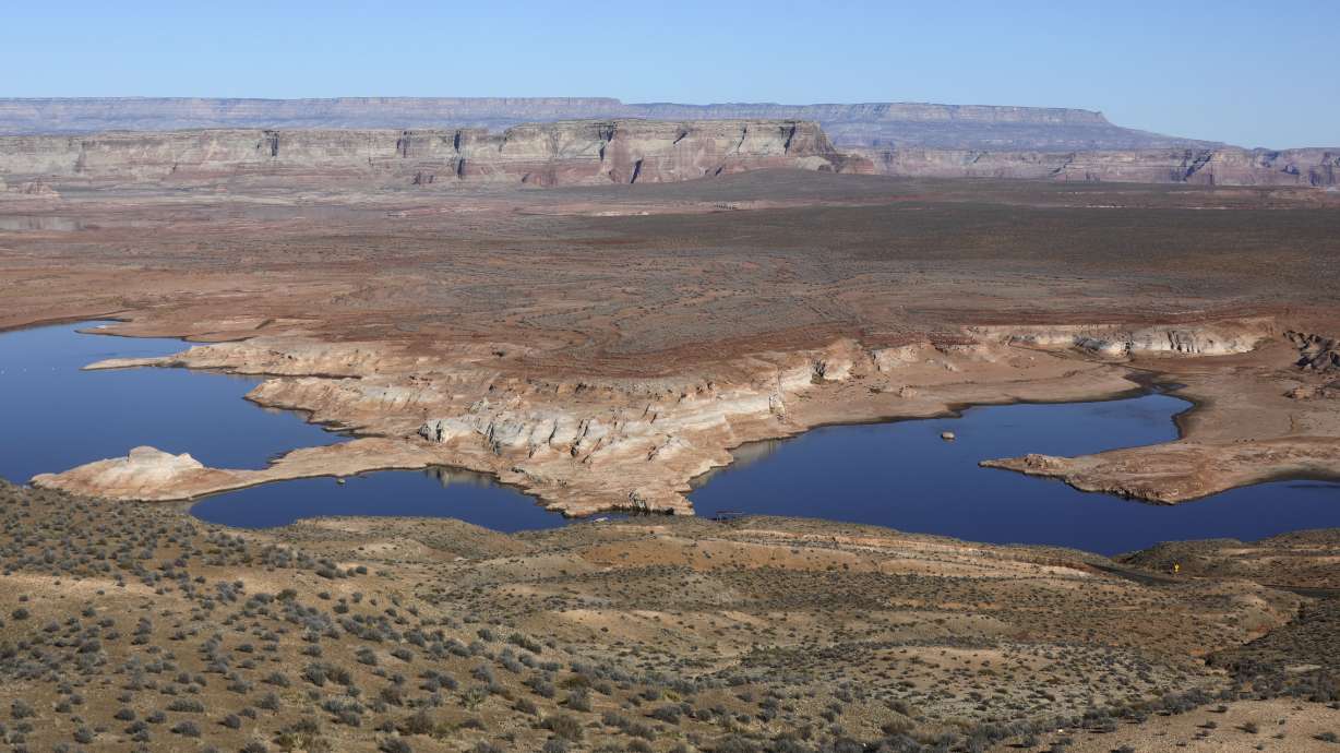 Low water levels are pictured in Lake Powell on Dec. 18, 2021. Gov. Spencer Cox on Thursday issued a state of emergency regarding the state's drought. Utah and three other states also approved a plan to send water from Flaming Gorge to Lake Powell.