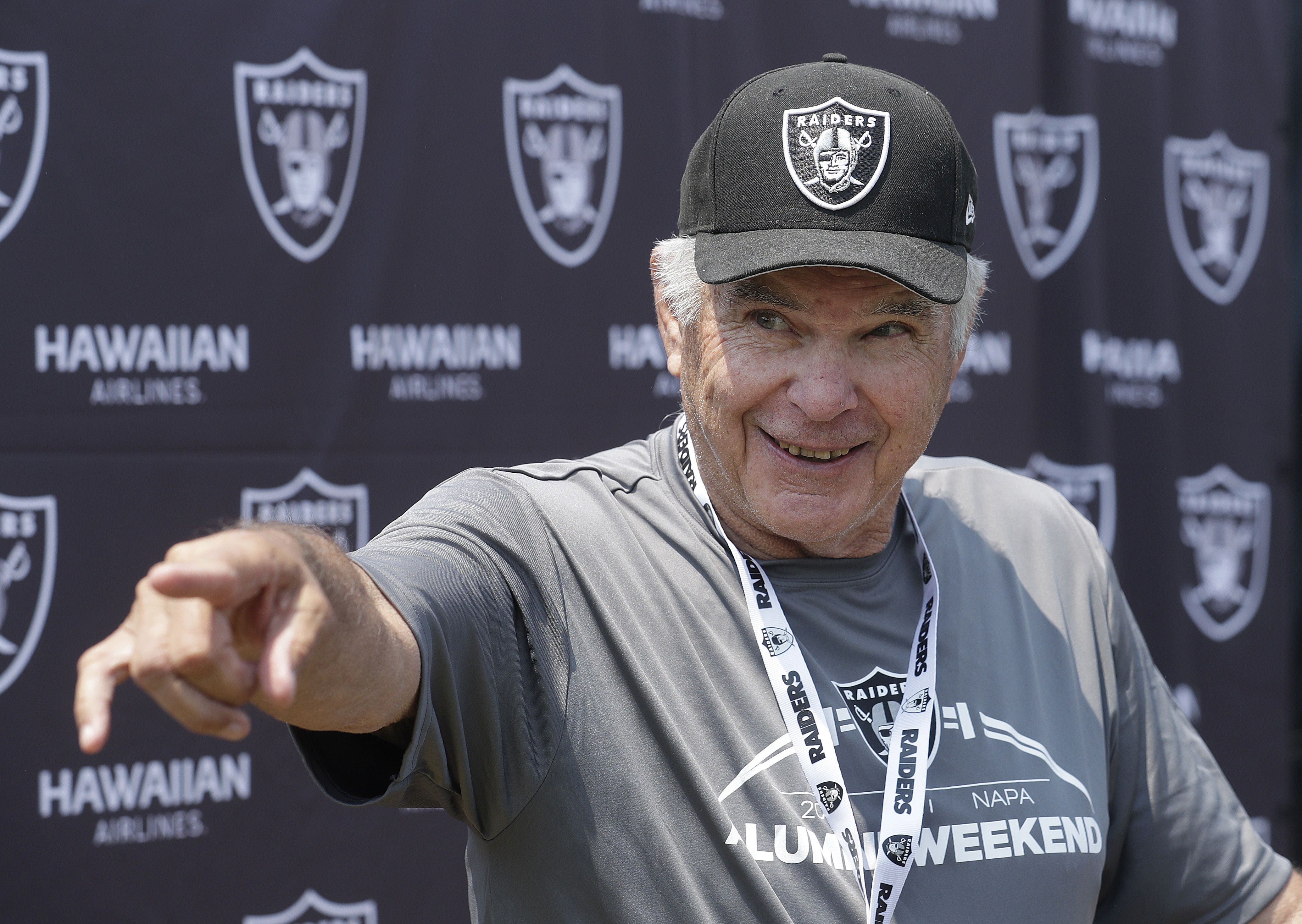 FILE - Former NFL football player Daryle Lamonica speaks at a news conference as part of Oakland Raiders alumni weekend after a Raiders NFL football practice in Napa, Calif., Saturday, July 28, 2018. Lamonica, the deep-throwing quarterback who won an AFL Player of the Year award and led the Raiders to their first Super Bowl appearance, has died. He was 80. The Fresno County Sherriff's said Lamonica passed away at his Fresno home on Thursday morning, April 21, 2022. 