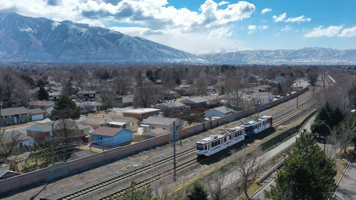 A UTA Trax train travels through Sandy on March 10. Gov. Spencer Cox said Thursday he's open to making public transit free in the future with the state picking up the fare tab.