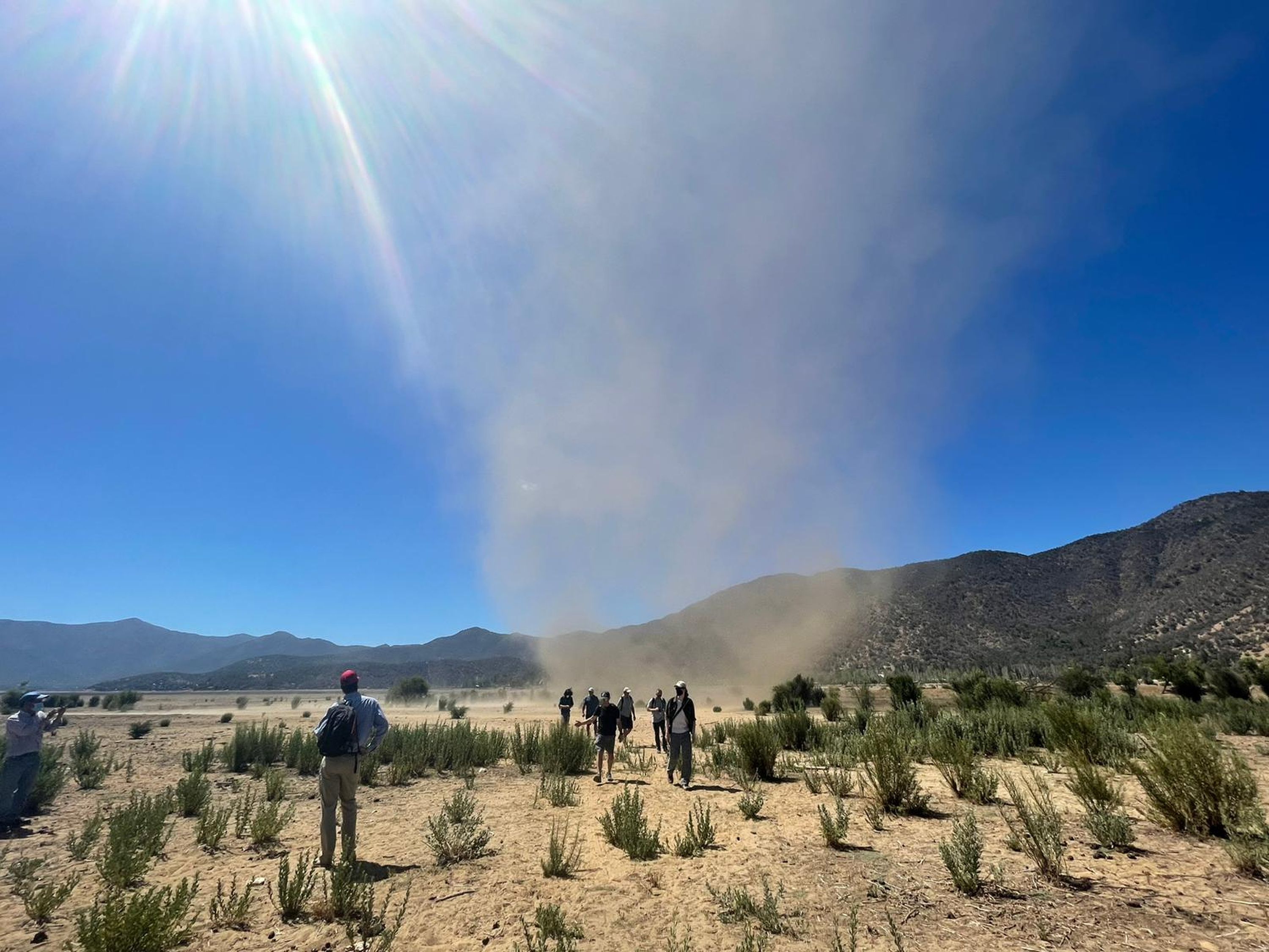 A dust storm whips up in January 2022 at the former Lake Aculeo in Chile. The lake completely dried up in May 2018 due to drought, overpumping of groundwater, rapid population growth and agricultural as well as urban diversions. It serves as a cautionary tale for the dwindling Great Salt Lake.