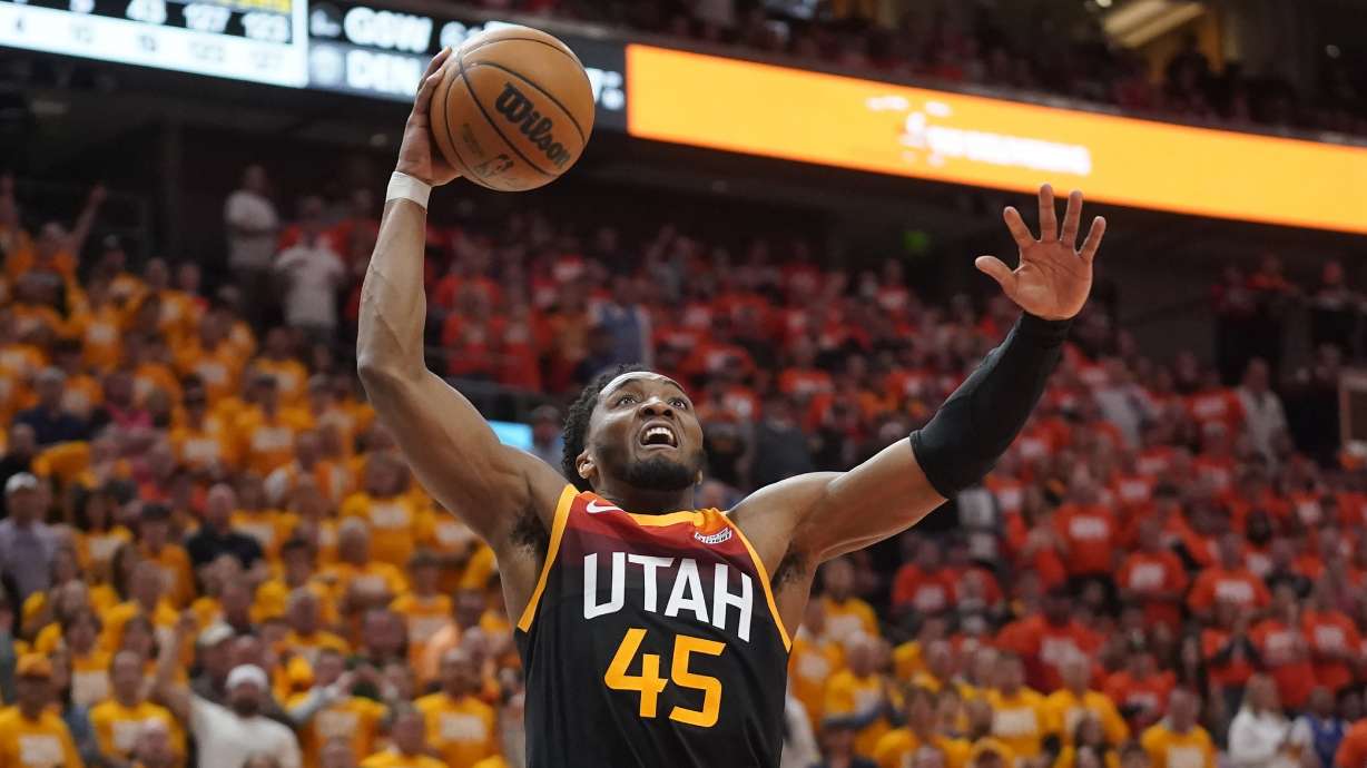 Utah Jazz guard Donovan Mitchell goes to the basket during the second half of Game 3 of the team'ss NBA basketball first-round playoff series against the Dallas Mavericks on Thursday, April 21, 2022, in Salt Lake City.