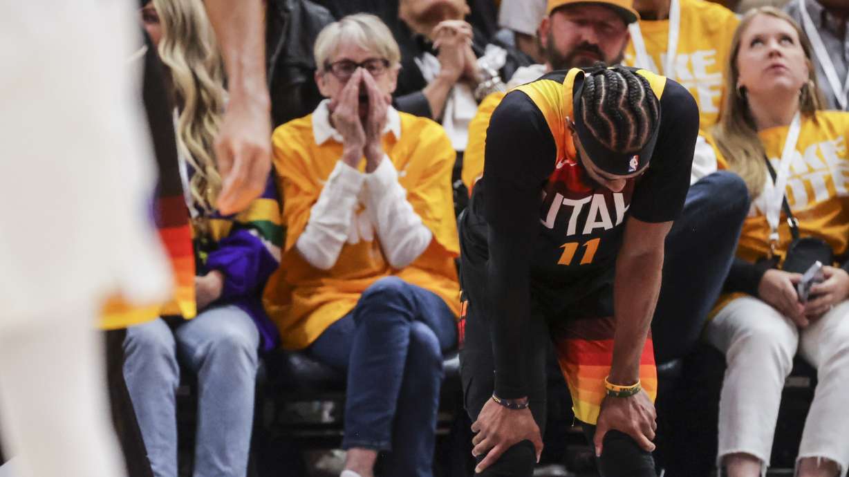 Utah Jazz guard Mike Conley (11) reacts to a play as the Utah Jazz and Dallas Mavericks play at Game 3 of an NBA basketball first-round playoff series at Vivint Arena in Salt Lake City on Thursday, April 21, 2022.