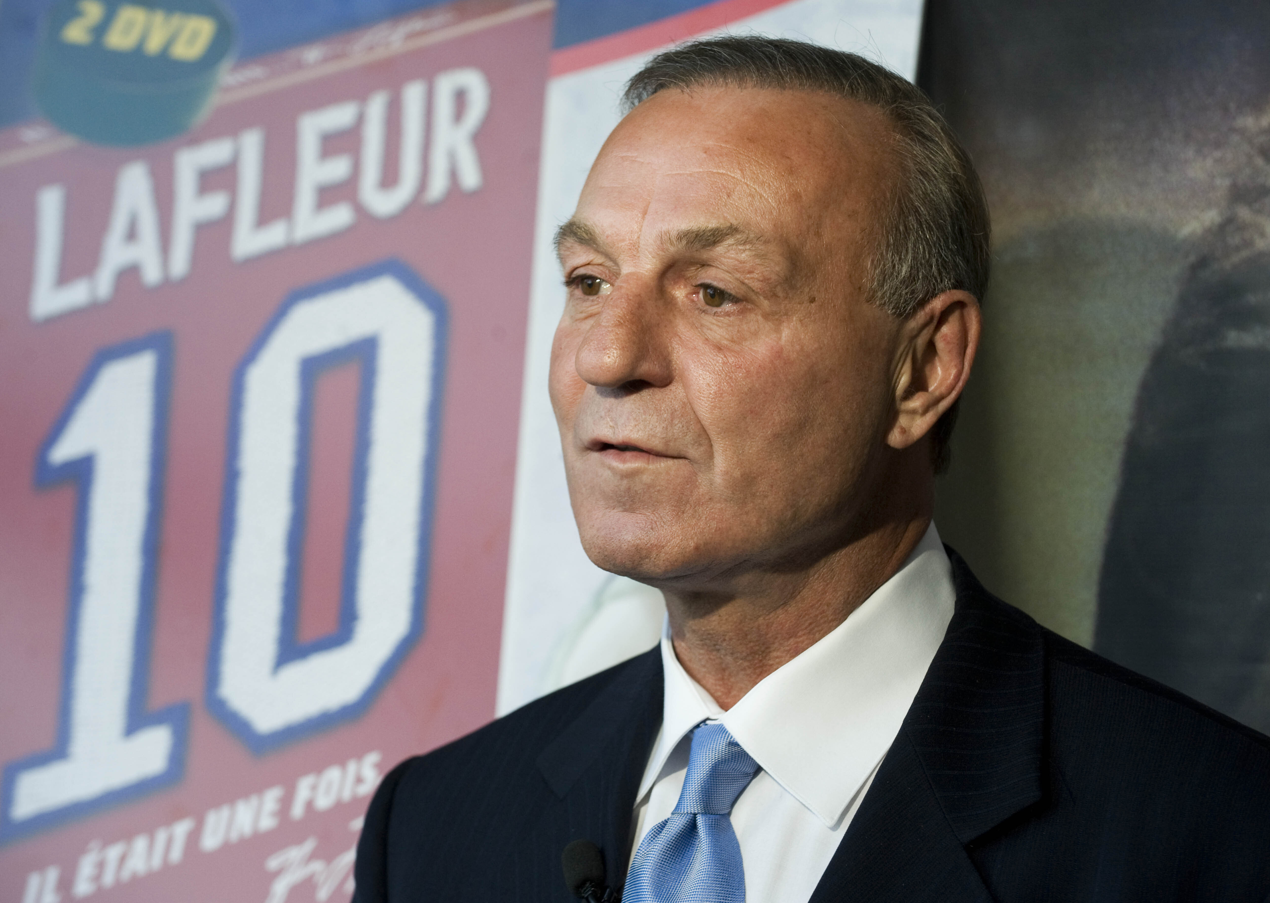 FILE -Hockey legend Guy Lafleur speaks to the media at the official launch of a DVD on his life "IL Etait Une Fois...Guy Lafleur" in Montreal, Monday, Nov. 2, 2009. Hockey Hall of Famer Guy Lafleur, who helped the Montreal Canadiens win five Stanley Cup titles in the 1970s, died Friday, April 22, 2022, at age 70.