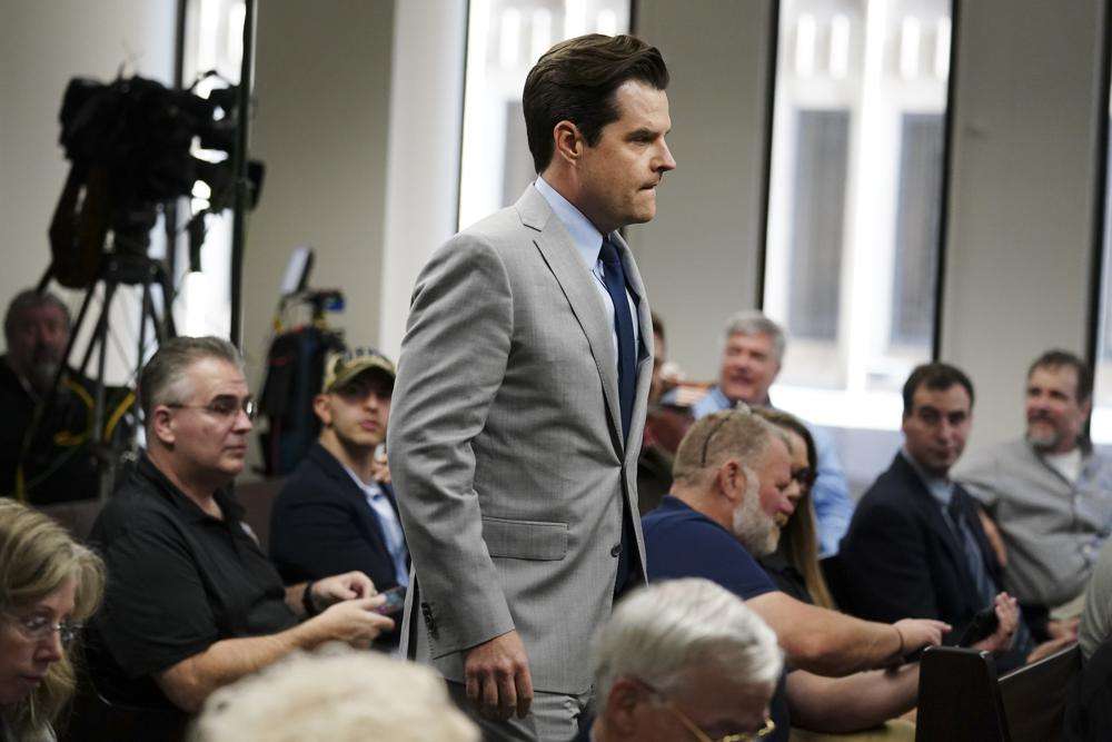 Republican Rep. Matt Gaetz, R-Fla., walks in the courtroom ahead of U.S. Rep. Marjorie Taylor Greene hearing, Friday, in Atlanta. Taylor Greene appeared at a hearing Friday in Atlanta in a challenge filed by voters who say she shouldn't be allowed to seek reelection because she helped facilitate the attack on the Capitol that disrupted certification of Joe Biden's presidential victory.